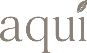 aquí